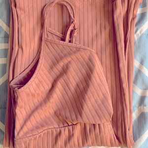 Maternity self belted rib- knit slip jumpsuit. Color is dusty pink.